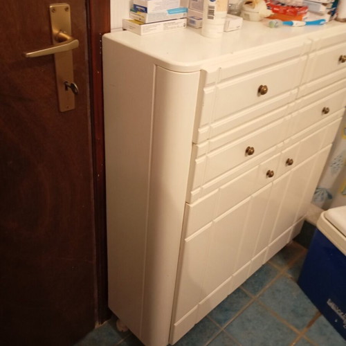 White cabinet with four drawers used