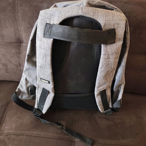 NOD anti-theft backpack used, gray with laptop compartment and USB