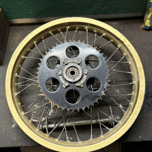 Suzuki SX 200 rear wheel used with drum and axle