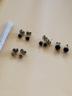 Earrings used, 4 pairs with dark stones