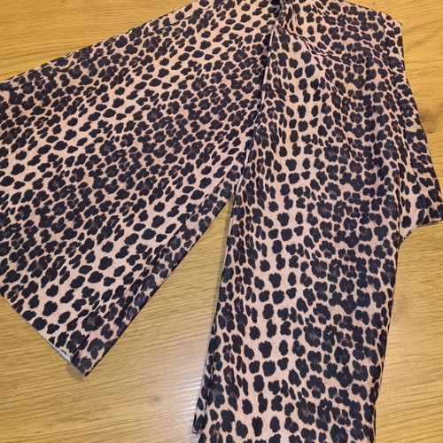 Leopard bell-bottom pants like new, size S
