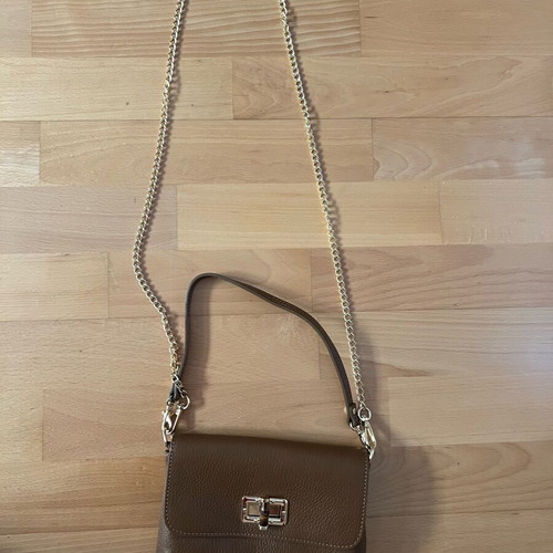 Women's brown shoulder bag new with gold details