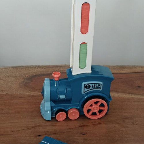 Domino train automatic toy with 56 domino pieces