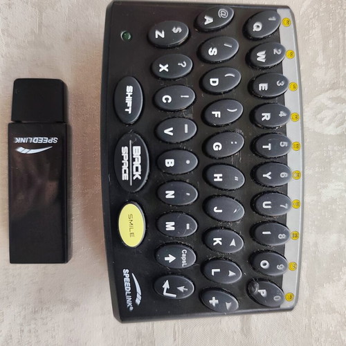 Speedlink Bluetooth Keyboard for PlayStation 3 used with USB receiver and controller stand
