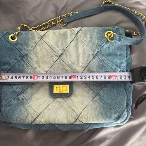 Denim shoulder bag like new with bronze details