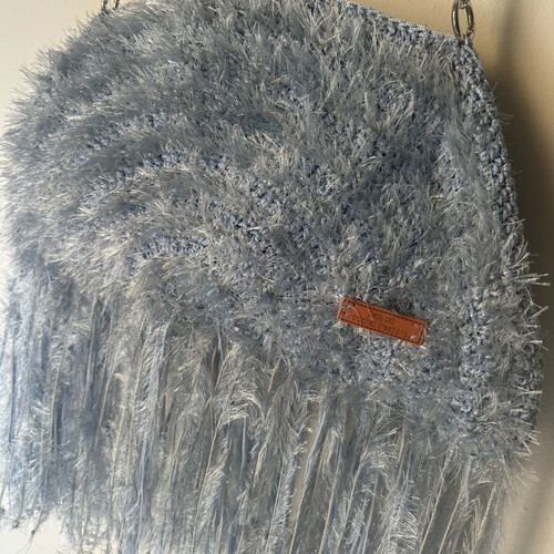 Handmade knitted shoulder bag turquoise with fringes and fluffy texture