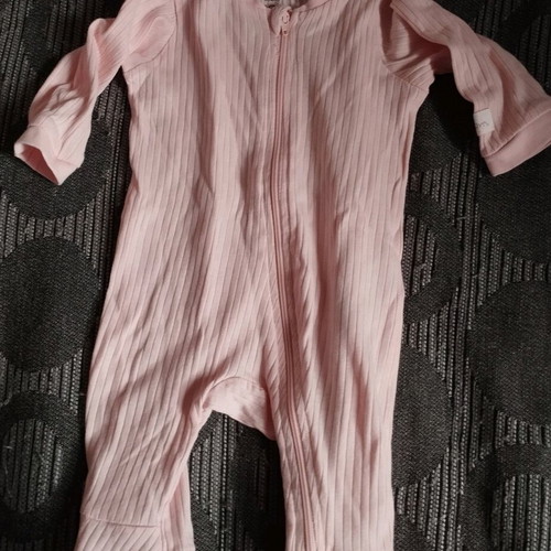 Full-body baby romper used in very good condition