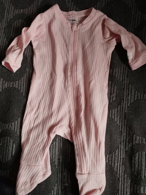 Full-body baby romper used in very good condition