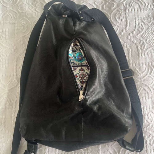 Leather backpack used with inner lining and fabric straps