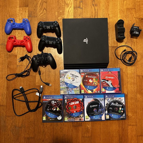 PlayStation 4 Pro 1TB like new with 3 controllers and 7 games