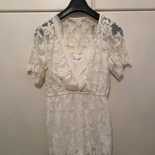 One-piece romper size S like new, white with transparent details