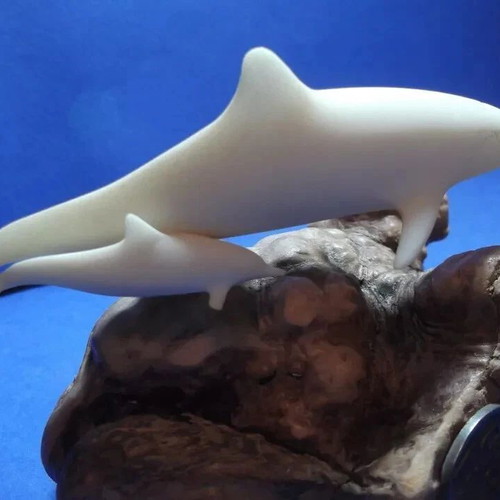 Vintage John Perry sculpture with 2 white dolphins, like new, wood
