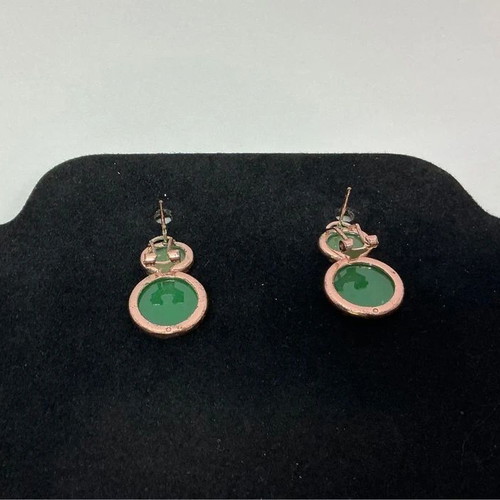 Green stud earrings with two shiny stones