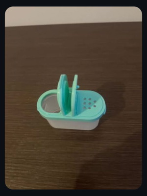 Taperware container new