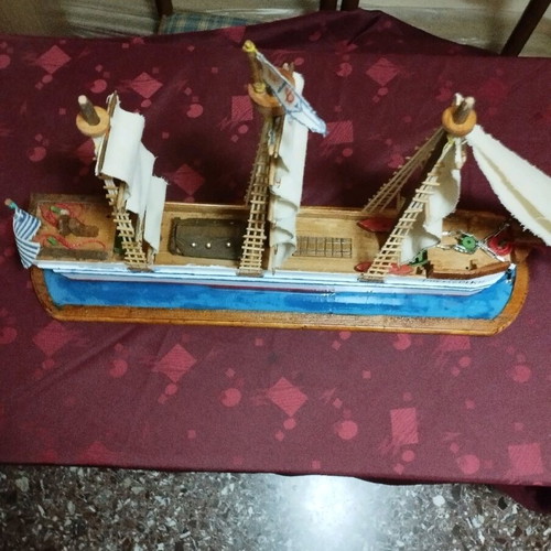 Handmade sailboat on base new with three masts