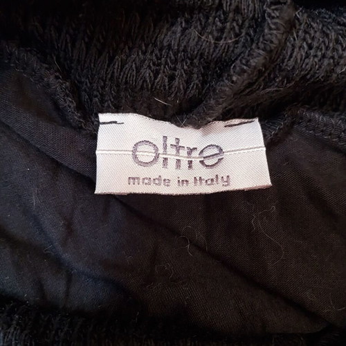 Oltre dress maco with knitted collar and metal details used