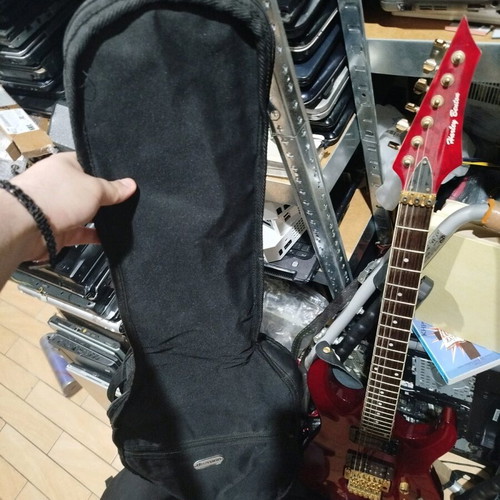 Electric guitar used for repair or decor