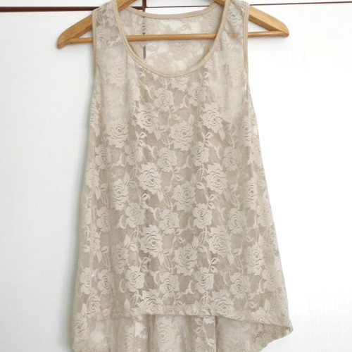 Lace blouse beige size L like new with sporty back and asymmetric style