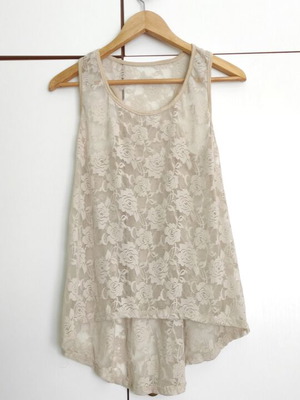 Lace blouse beige size L like new with sporty back and asymmetric style