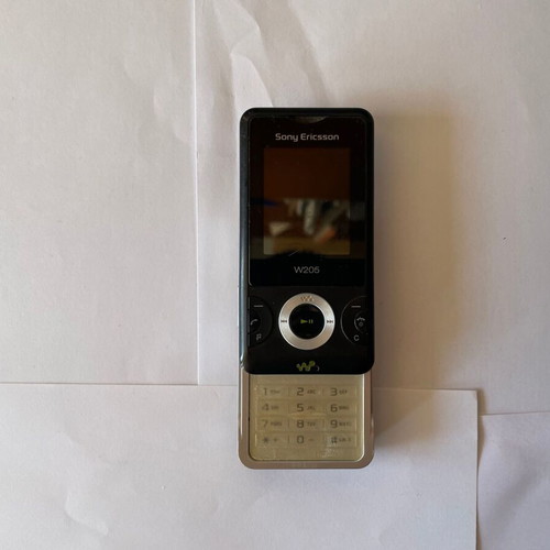 Sony Ericsson W205 used mobile phone with charger without battery