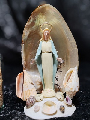Handmade Virgin Mary statue with natural seashells