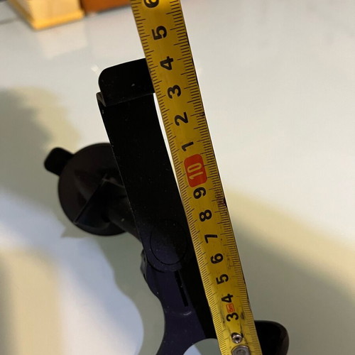 Phone holder used for car with self-adhesive system