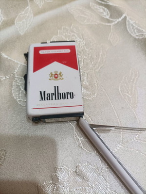 Marlboro cigarette case and lighter used