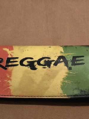 Reggae tobacco pouch used, made of synthetic leather