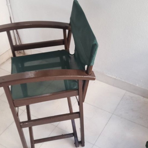 Outdoor lounge furniture used with 4 director chairs and metal table