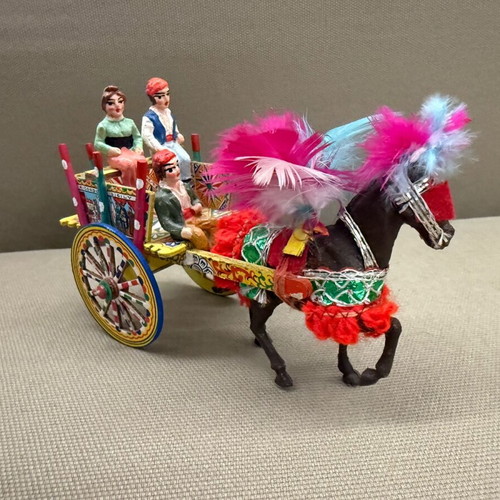 Vintage Sicilian cart with horse and tambourine decoration