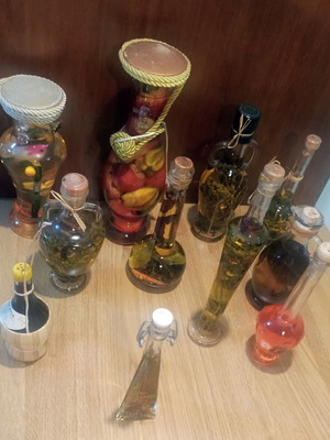 Decorative glass bottles with fruits, oils, and drinks, set of 11, new