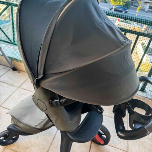 Stokke Xplory X Rich Black stroller used with gift bag set, changing mat, pouch