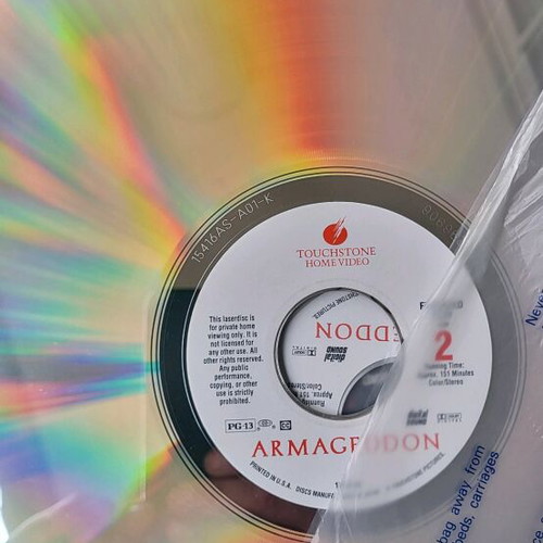 Armageddon laserdisc used with light scratches