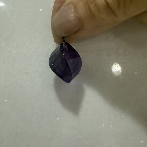 Amethyst pendant with silver bail