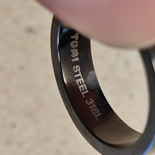 Tumi men's ring size 10 surgical steel like new