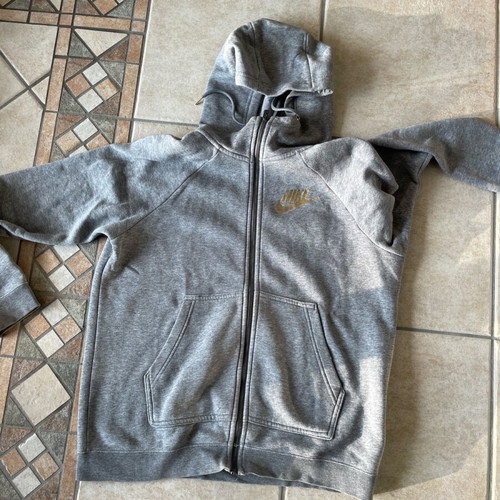 Nike jacket used gray with gold details and small defects