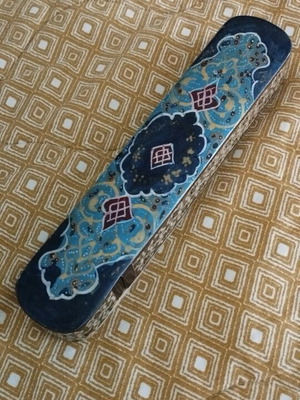 Wooden case with traditional designs like new