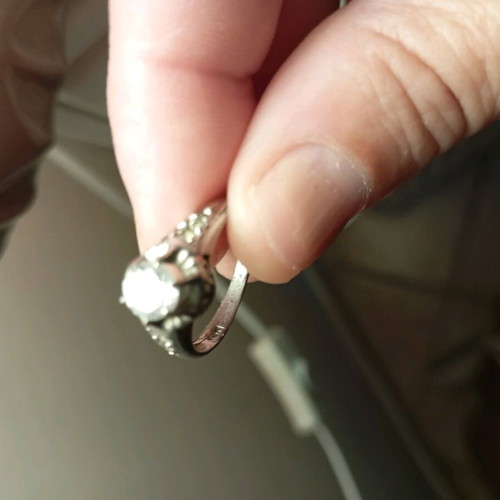 Women's white gold solitaire ring like new with zircon stones