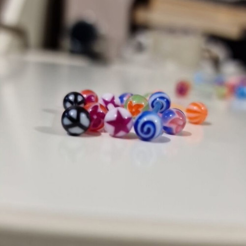 Tongue Piercing Earrings new, pack of 40 colorful plastic pieces