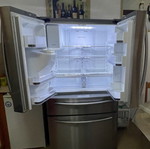 Samsung side by side refrigerator with ice maker and water filter, model FR24FSEDBSR
