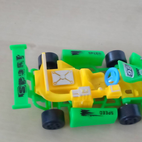 Plastic pull-back kart toy used