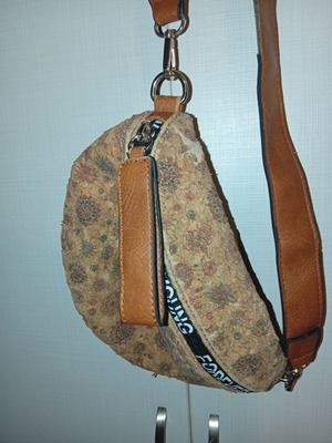 Waist bag crossbody with brown strap and unique print like new