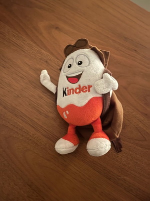 Kinder plush toy with backpack like new