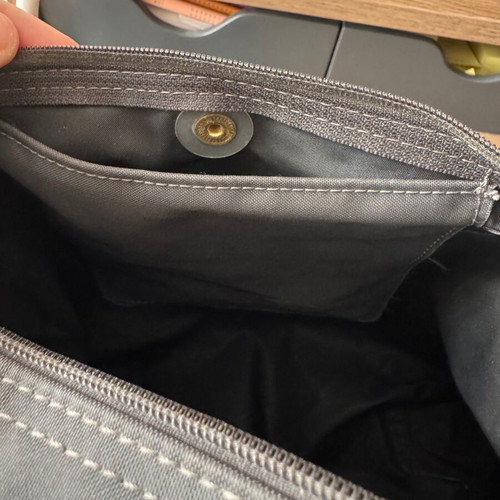 Longchamp backpack used, zipper needs repair, beige and gray