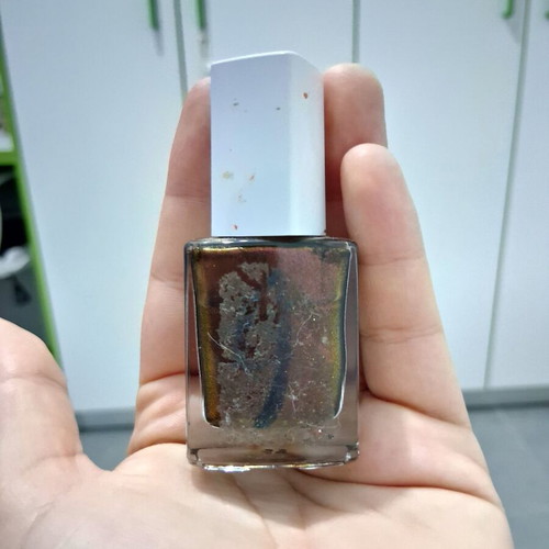 Brown shiny nail polish used
