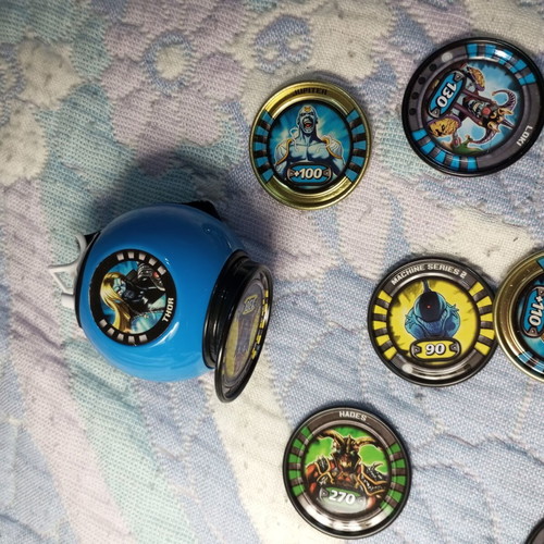Marvel Slingers game used with launcher and 9 medals