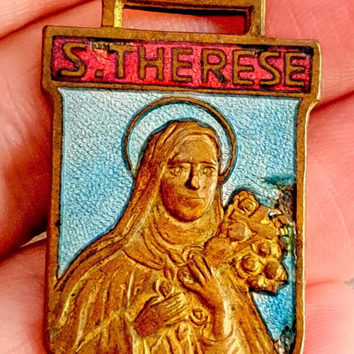 Vintage double-sided pendant used, featuring S.Therese and S. Christophe