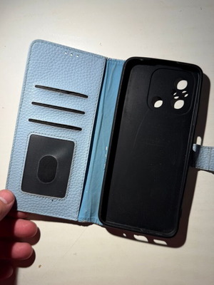Leather wallet phone case used, light blue