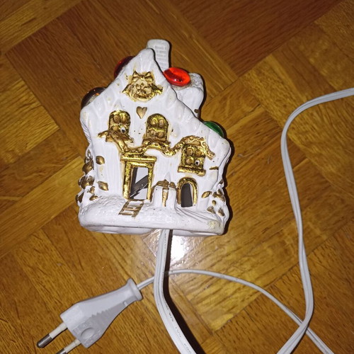 Small white church-shaped lamp with multicolor lights like new