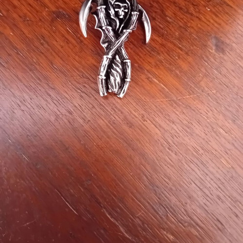 Pendant Haros with two sickles steel like new, silver